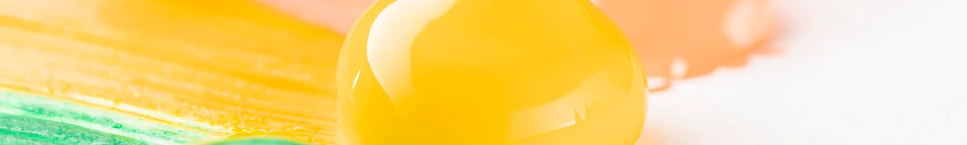 a65b1f48-9ad6-4cd6-a7ab-0c28d8f63c25-close-up-colorful-paint-white-table.jpg